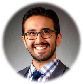 A person wearing glasses and a suit

AI-generated content may be incorrect.
